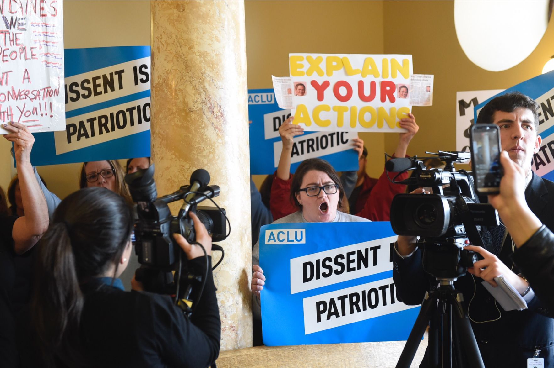 Daines protesters
